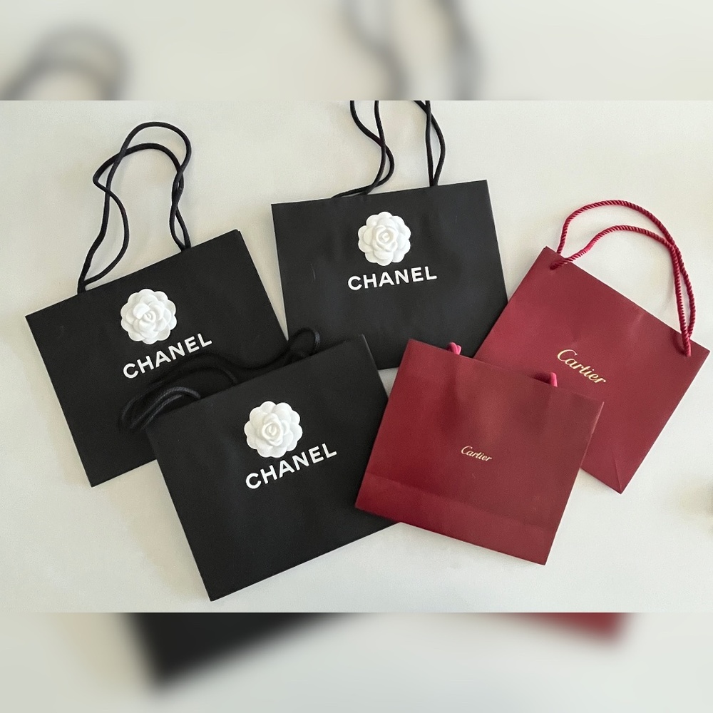 Set of 5 Cartier and Chanel Shopping Bags With Camellia